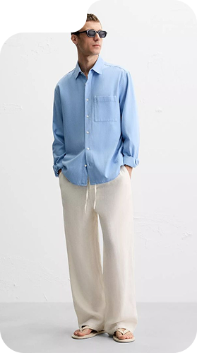 Model wearing a blue shirt